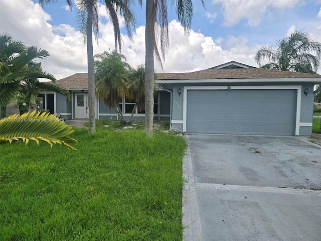 1744 SE Berkshire Blvd, Port St Lucie, FL 34952 - single story home with stucco siding, concrete driveway, an attached garage, and a front lawn
