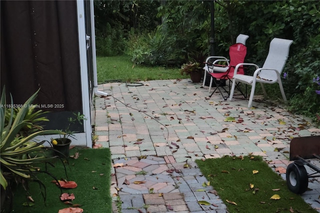 256 Broward Ave, Green Acres, FL 33463 - view of patio / terrace