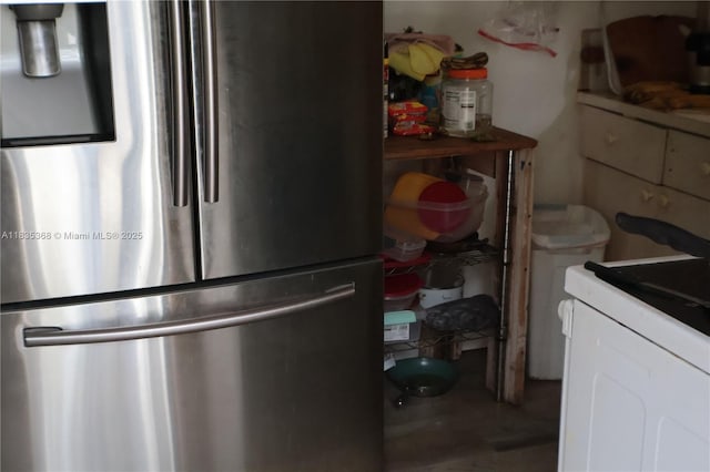 256 Broward Ave, Green Acres, FL 33463 - kitchen with freestanding refrigerator and washer / dryer