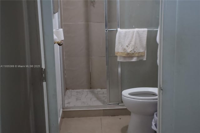 256 Broward Ave, Green Acres, FL 33463 - bathroom featuring a stall shower and tile patterned floors
