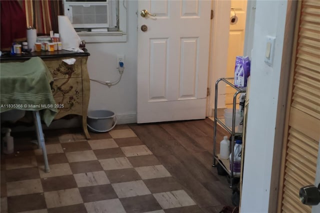 256 Broward Ave, Green Acres, FL 33463 - doorway featuring dark floors and cooling unit