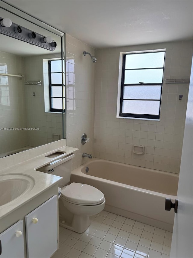 18240 Mediterranean Blvd Unit 5-11, Hialeah, FL 33015 - bathroom with tile patterned floors, washtub / shower combination, and vanity