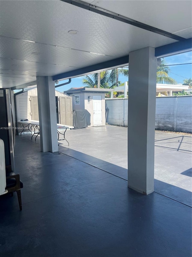 11925 SW 6th St, Miami, FL 33184 - fenced backyard featuring a patio area and a storage unit