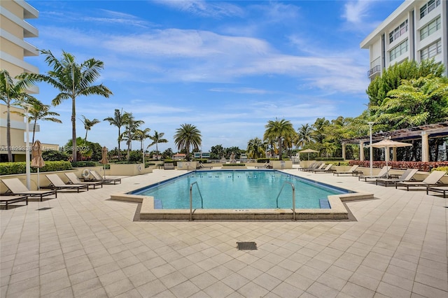 5600 Collins Ave Unit 10L, Miami Beach, FL 33140 - community pool featuring a patio