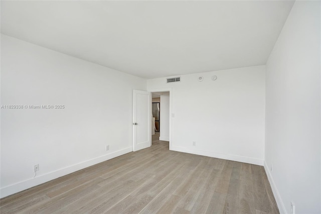 5600 Collins Ave Unit 10L, Miami Beach, FL 33140 - empty room featuring light wood-style floors and baseboards