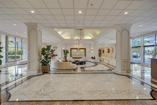 5600 Collins Ave Unit 10L, Miami Beach, FL 33140 - community lobby with recessed lighting, crown molding, and a decorative wall