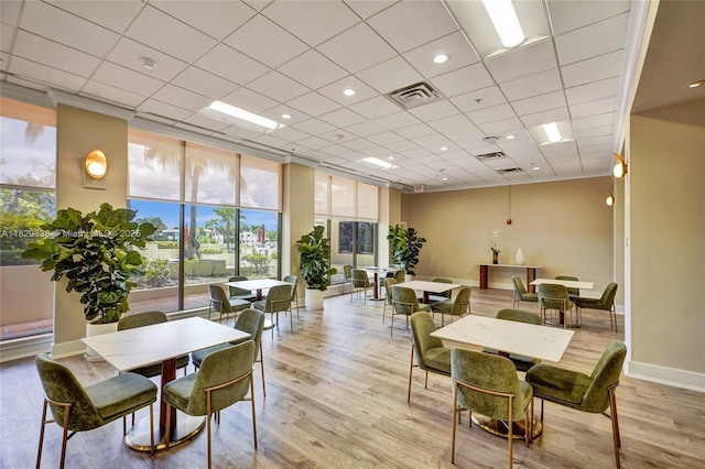 5600 Collins Ave Unit 10L, Miami Beach, FL 33140 - dining space with light wood-type flooring and baseboards