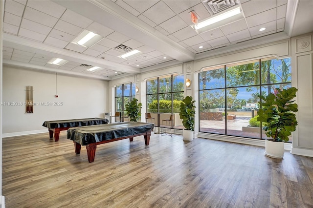 5600 Collins Ave Unit 10L, Miami Beach, FL 33140 - game room with healthy amount of natural light, billiards table, wood finished floors, and a drop ceiling