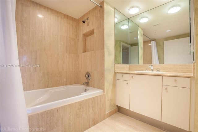 7000 Island Blvd Unit 2504, Aventura, FL 33160 - bathroom featuring tiled shower / bath combo and vanity
