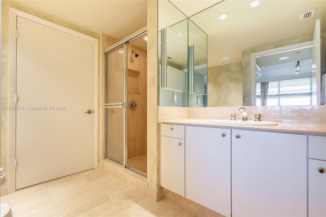 7000 Island Blvd Unit 2504, Aventura, FL 33160 - bathroom featuring vanity, a stall shower, and tile patterned floors
