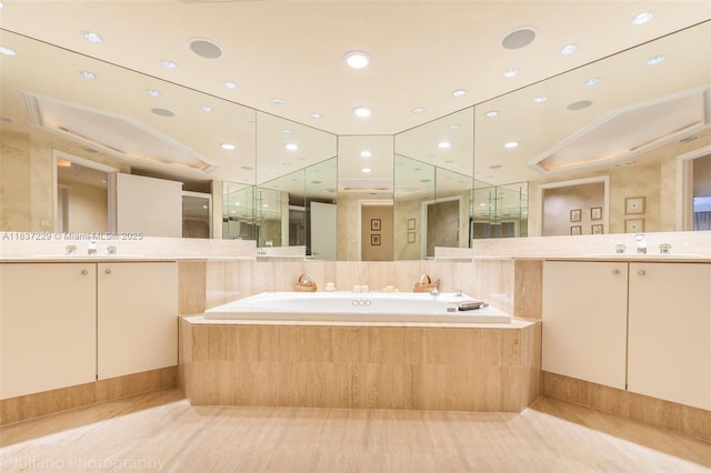 7000 Island Blvd Unit 2504, Aventura, FL 33160 - full bath featuring vanity and a garden tub