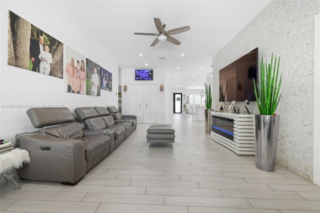 8236 SW 36th St, Miami, FL 33155 - living area with a ceiling fan, a glass covered fireplace, and recessed lighting