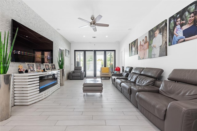 8236 SW 36th St, Miami, FL 33155 - living area featuring ceiling fan, wood finished floors, a glass covered fireplace, and recessed lighting