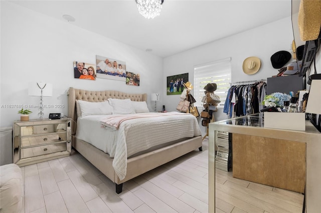 8236 SW 36th St, Miami, FL 33155 - bedroom with light wood-style flooring and a chandelier