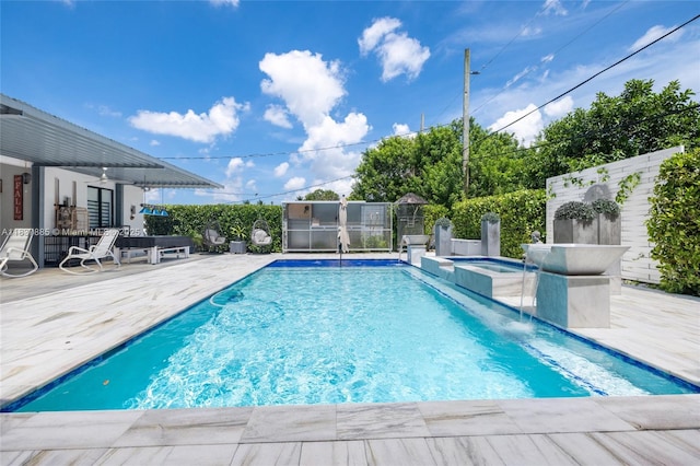 8236 SW 36th St, Miami, FL 33155 - view of swimming pool featuring a patio and a pool with connected hot tub