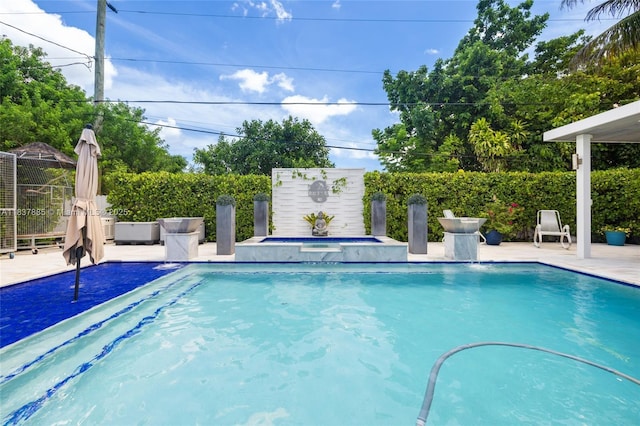 8236 SW 36th St, Miami, FL 33155 - view of swimming pool with an in-ground hot tub
