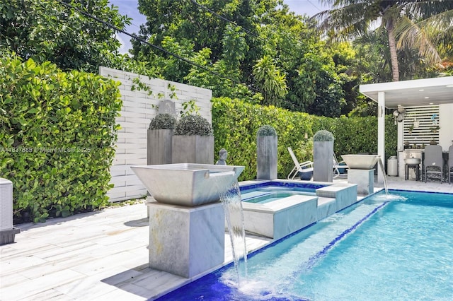 8236 SW 36th St, Miami, FL 33155 - view of swimming pool featuring a patio and a pool with connected hot tub