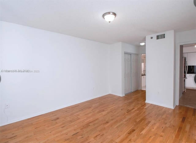 19501 E Country Club Dr Unit 9306, Aventura, FL 33180 - unfurnished room featuring light wood finished floors and baseboards