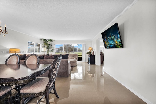 12650 SW 6th St Unit 101K, Pembroke Pines, FL 33027 - dining space with plenty of natural light, crown molding, and a textured ceiling
