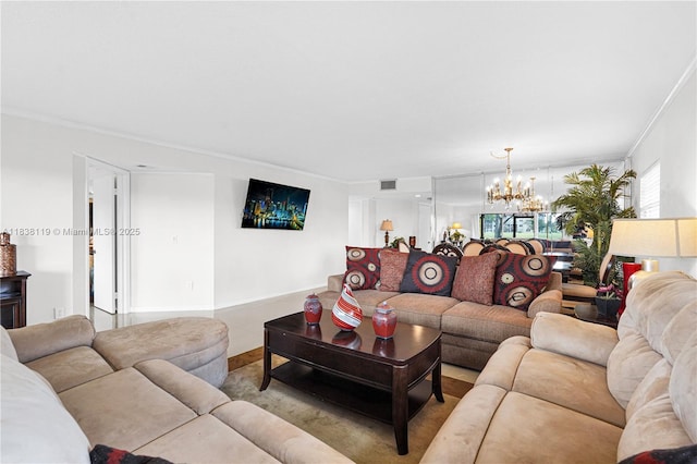 12650 SW 6th St Unit 101K, Pembroke Pines, FL 33027 - living room with a chandelier and crown molding