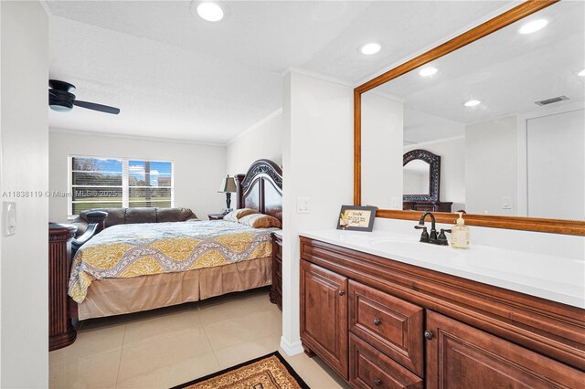 12650 SW 6th St Unit 101K, Pembroke Pines, FL 33027 - bedroom with light tile patterned floors, recessed lighting, ceiling fan, and ornamental molding