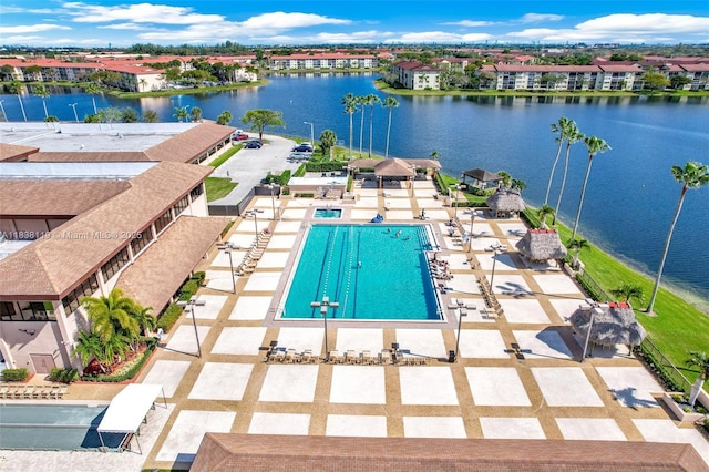 12650 SW 6th St Unit 101K, Pembroke Pines, FL 33027 - community pool featuring a water view and a patio