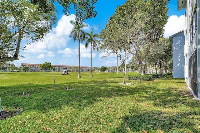 12650 SW 6th St Unit 101K, Pembroke Pines, FL 33027 - view of grassy yard