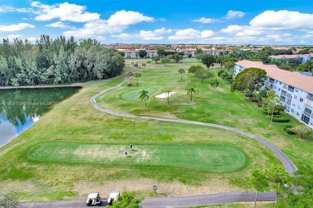 12650 SW 6th St Unit 101K, Pembroke Pines, FL 33027 - drone / aerial view of a large body of water and a golf club