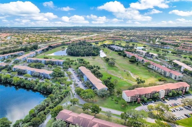 12650 SW 6th St Unit 101K, Pembroke Pines, FL 33027 - bird's eye view of a nearby body of water and a golf course