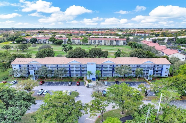 12650 SW 6th St Unit 101K, Pembroke Pines, FL 33027 - drone / aerial view of apartment complex / building and a local golf course