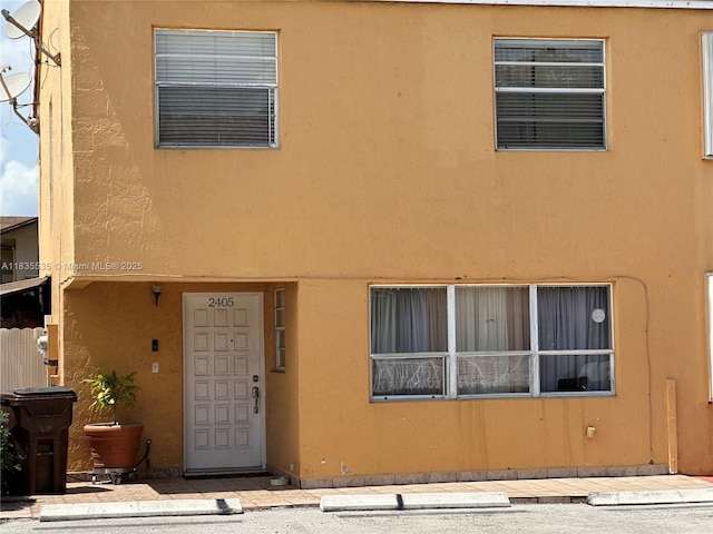 2405 W 54th Pl Unit 03, Hialeah, FL 33016 - property entrance featuring stucco siding