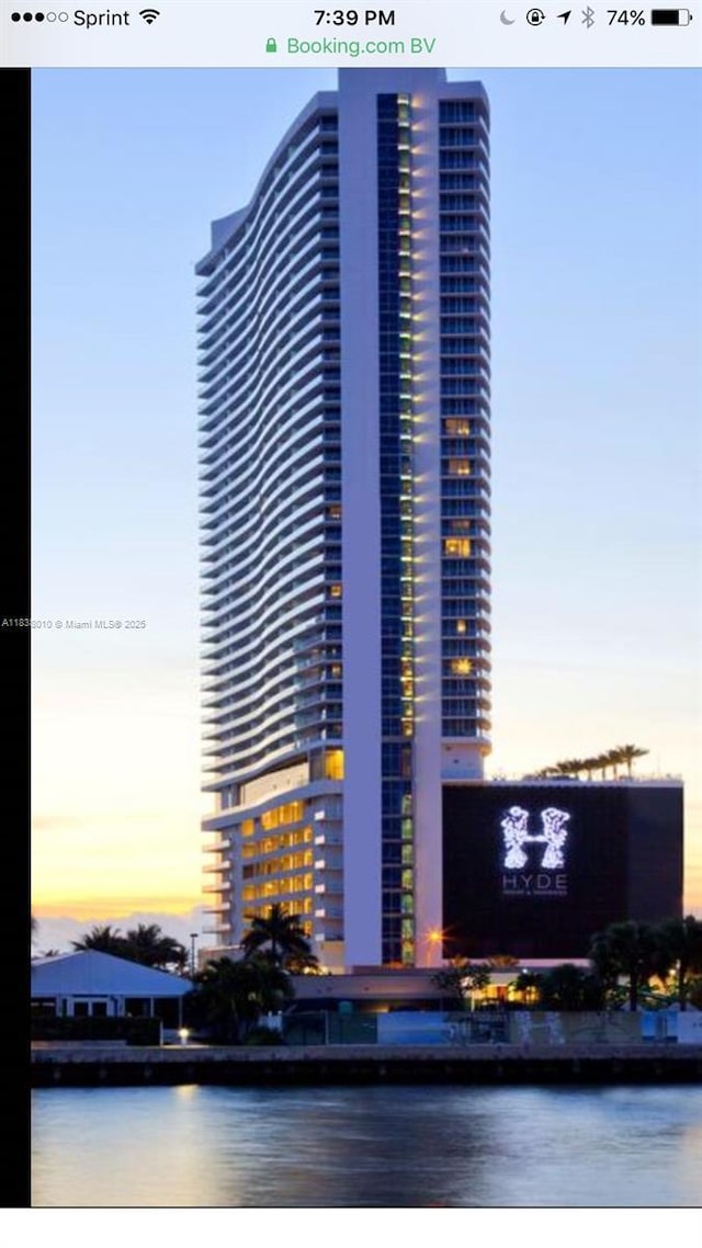 4111 S Ocean Dr Unit 3105, Hollywood, FL 33019 - property at dusk featuring a water view and a city view