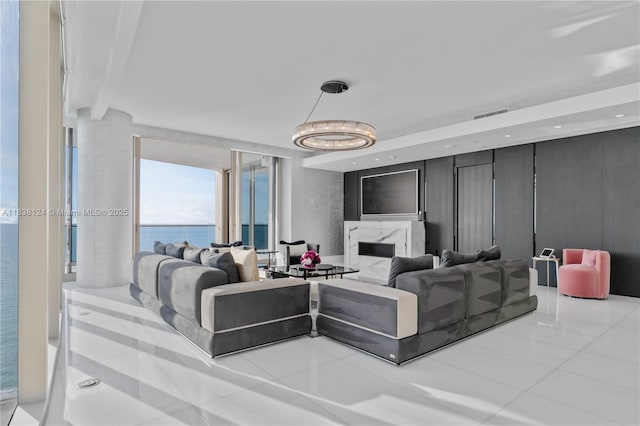 17975 Collins Ave Unit 1202, Sunny Isles Beach, FL 33160 - living room featuring tile patterned floors and a chandelier