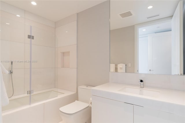 17975 Collins Ave Unit 1202, Sunny Isles Beach, FL 33160 - bathroom with vanity, combined bath / shower with glass door, and recessed lighting