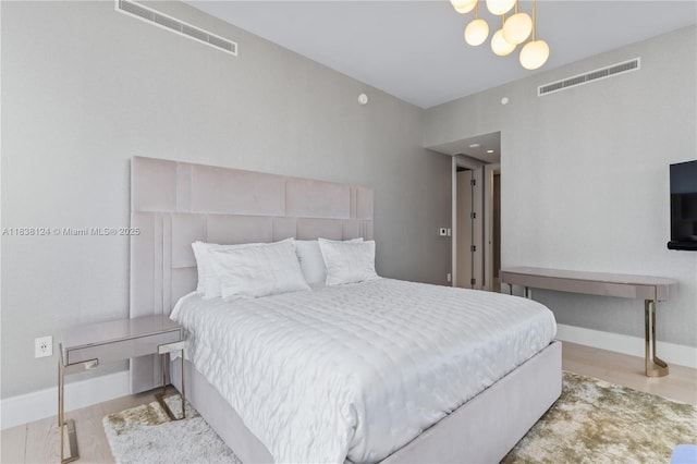 17975 Collins Ave Unit 1202, Sunny Isles Beach, FL 33160 - bedroom featuring wood finished floors and baseboards