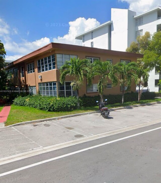 1040 94th St, Bay Harbor Islands, FL 33154 - view of property with uncovered parking