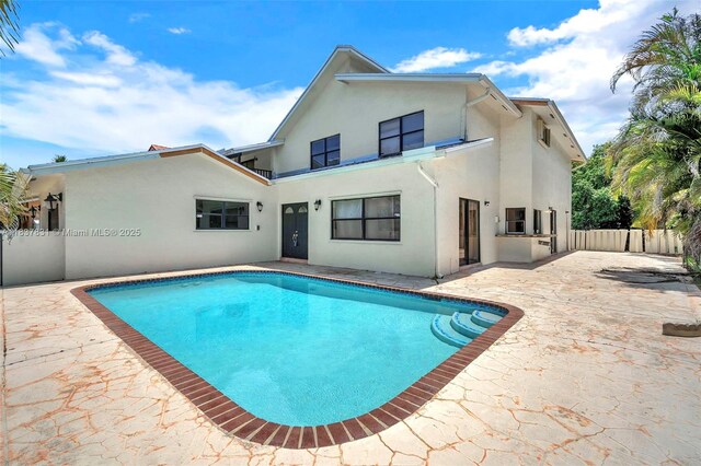 911 Mockingbird Ln, Plantation, FL 33324 - view of pool featuring a patio area