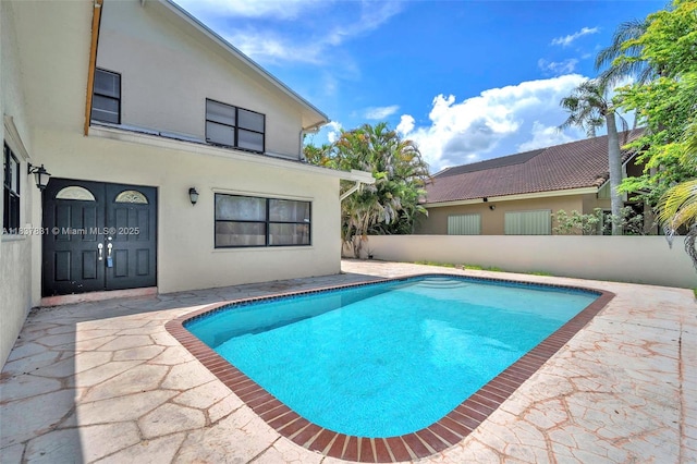 911 Mockingbird Ln, Plantation, FL 33324 - outdoor pool with a patio