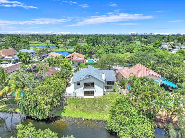 911 Mockingbird Ln, Plantation, FL 33324 - aerial view of property and surrounding area with a nearby body of water and a tree filled landscape