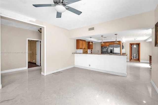 911 Mockingbird Ln, Plantation, FL 33324 - unfurnished living room featuring ceiling fan and baseboards