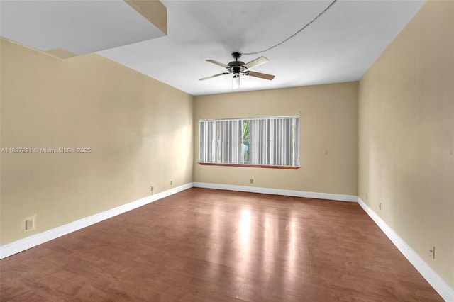911 Mockingbird Ln, Plantation, FL 33324 - unfurnished room featuring ceiling fan and wood finished floors