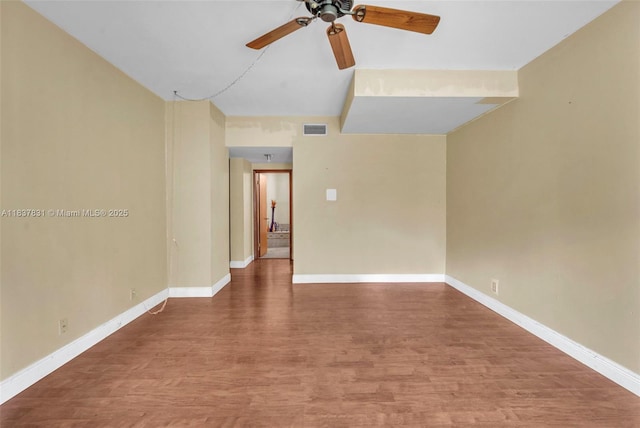 911 Mockingbird Ln, Plantation, FL 33324 - spare room featuring ceiling fan and wood finished floors