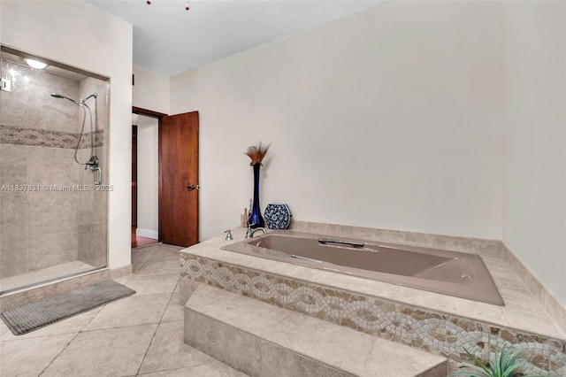 911 Mockingbird Ln, Plantation, FL 33324 - bathroom featuring a garden tub, tile patterned floors, and a tile shower