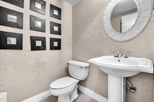 911 Mockingbird Ln, Plantation, FL 33324 - bathroom with toilet and tile patterned floors