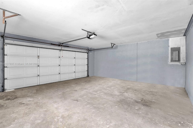 911 Mockingbird Ln, Plantation, FL 33324 - garage with electric panel and a garage door opener