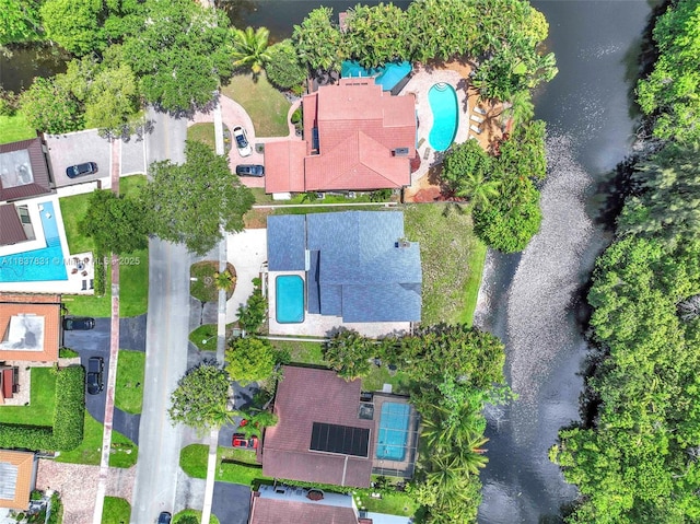911 Mockingbird Ln, Plantation, FL 33324 - aerial view of a pool and a large body of water