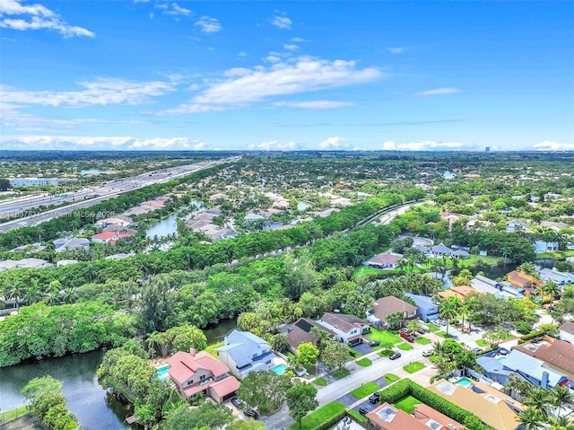 911 Mockingbird Ln, Plantation, FL 33324 - aerial view of property and surrounding area featuring nearby suburban area and a nearby body of water