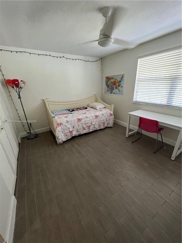 16171 Blatt Blvd Unit 104, Weston, FL 33326 - bedroom with a textured ceiling, dark wood-type flooring, and ceiling fan