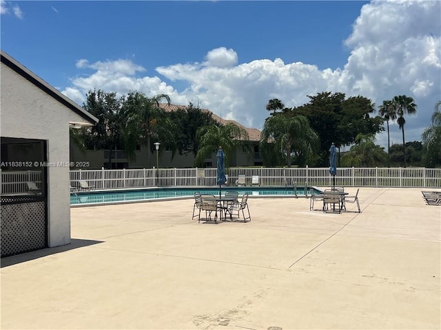 16171 Blatt Blvd Unit 104, Weston, FL 33326 - community pool featuring a patio area