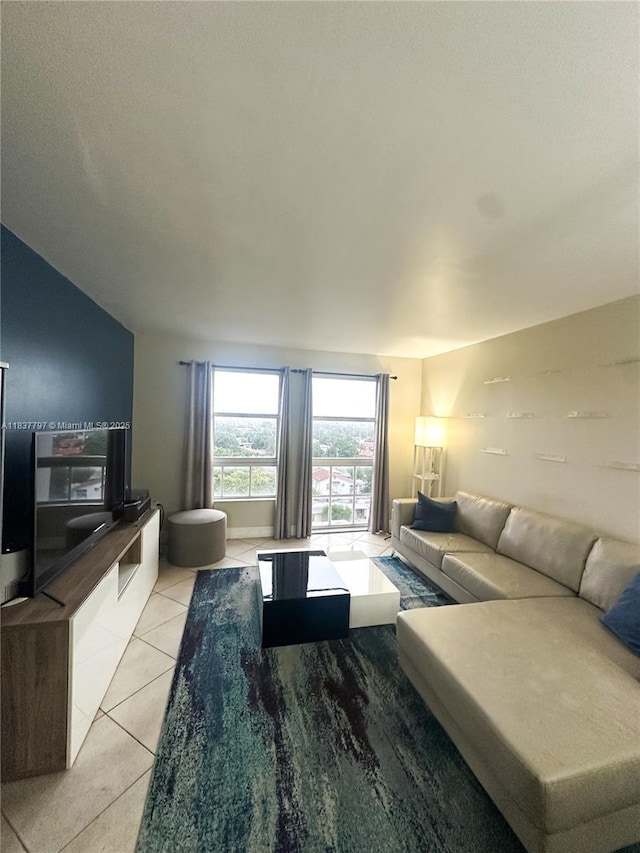 2351 Douglas Rd Unit 702, Miami, FL 33145 - living room with light tile patterned floors